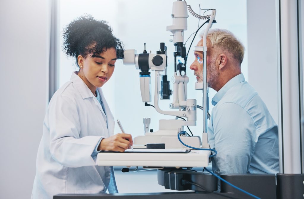 A patient undergoing an ocular health assessment during their comprehensive eye exam.